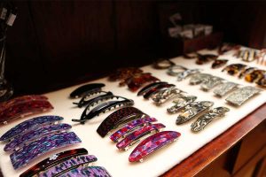 a display of decorative hair clips at Andrea's Red Dress, women's clothing boutique in Eugene, Oregon