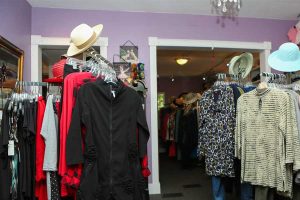 women's clothing on racks, a selection of high-end women's clothing brands in Eugene, Oregon, at Andrea's Red Dress