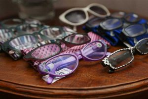a display of colorful reading glasses at Andrea's Red Dress in Eugene, Oregon